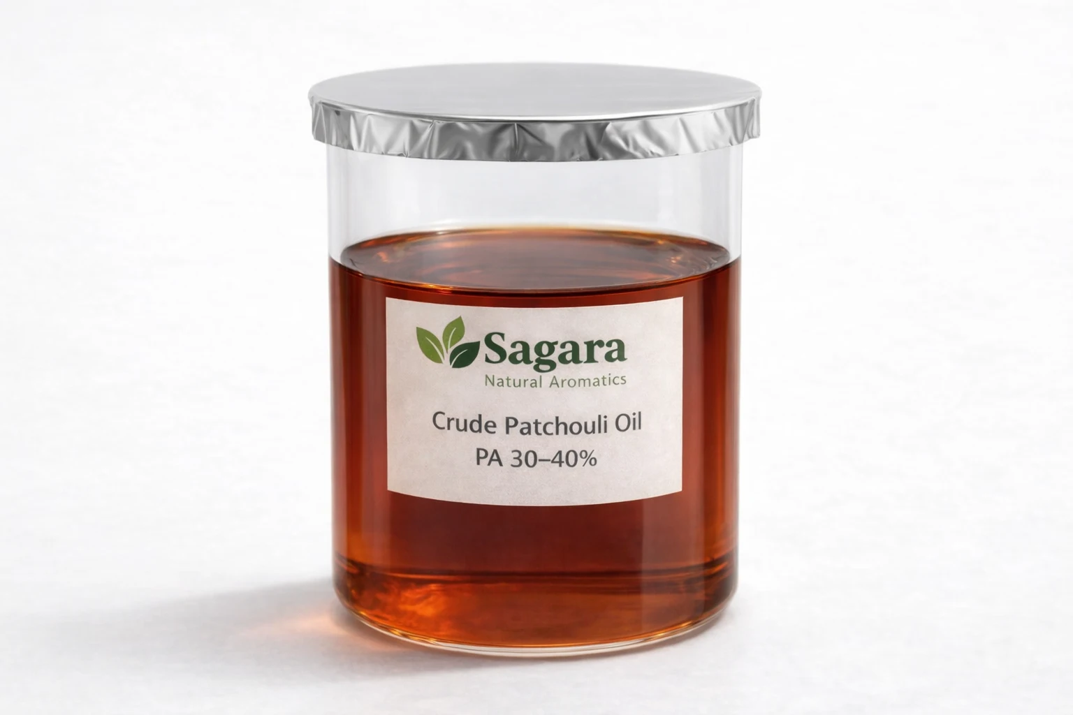 Crude Patchouli Oil Indonesia PA 30–40% – Sagara Natural Aromatics in glass container with amber color